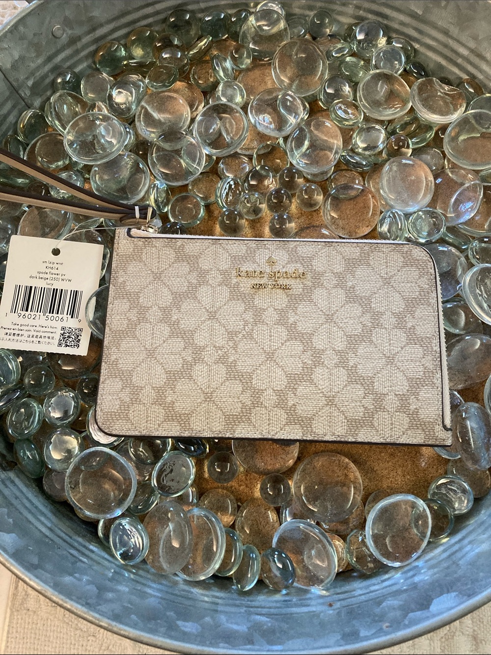 kate spade NWT small L-Zip Wristlet. Spade Flower Dark Beige “Lucy”